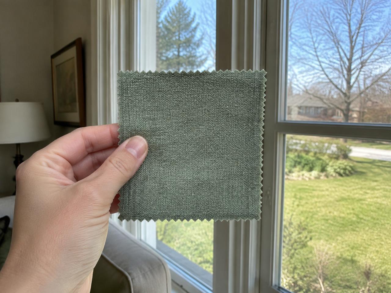 Drapery fabric swatch tested in daylight at a Wellesley, MA window